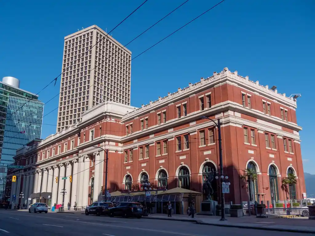 Red brick heritage building corner with Victorian craftsmanship in Vancouver