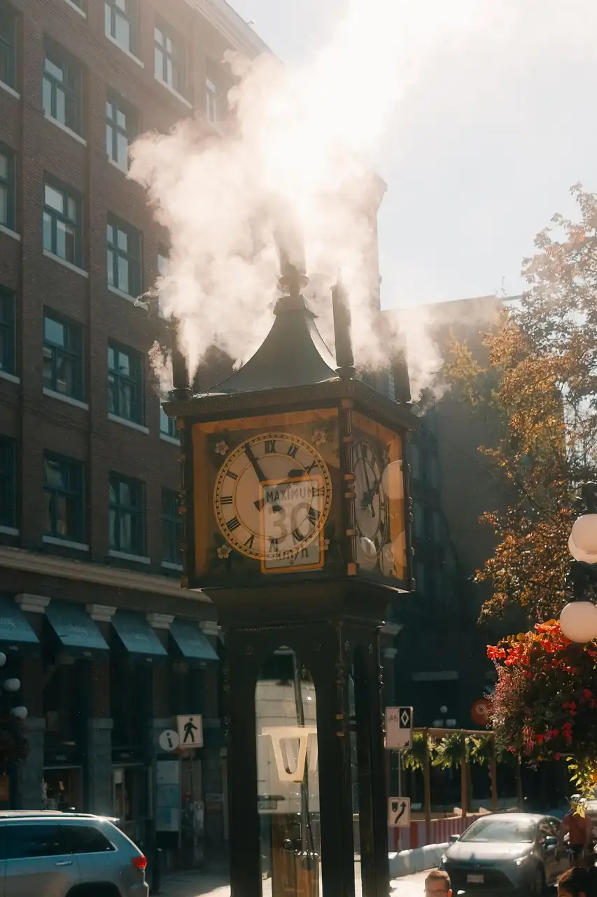Famous Gastown Steam Clock in Vancouver with steam rising on a sunny day