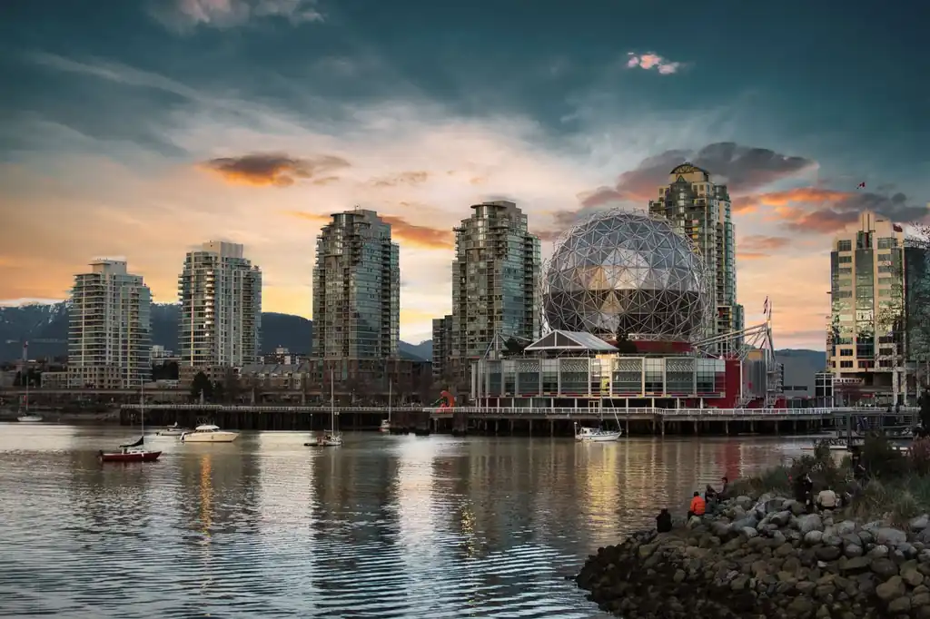 View of Vancouver skyline featuring geodesic architecture at twilight